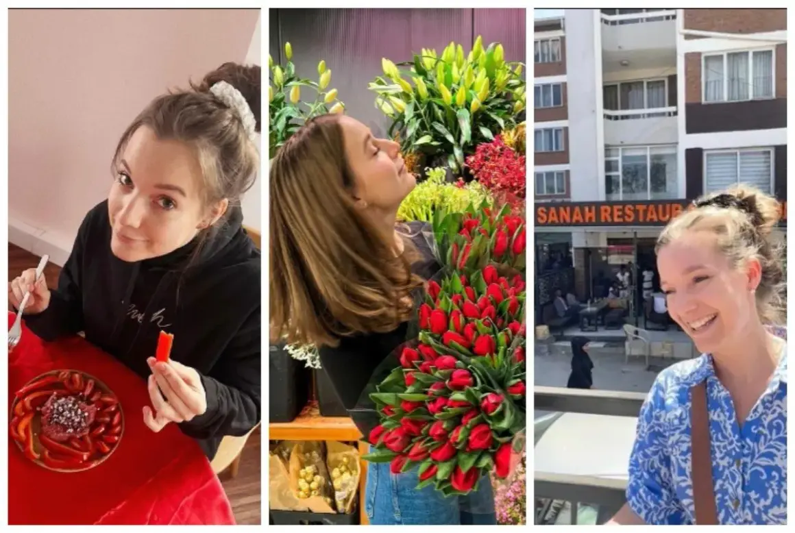 Uśmiechnięta dziewczyna, jak ma na imię sanah, z bukietem tulipanów przed restauracją Sanah.
